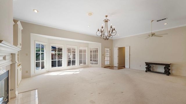 unfurnished living room featuring crown molding, light colored carpet, and ceiling fan with notable chandelier