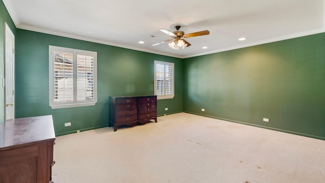 bedroom featuring light carpet, crown molding, and ceiling fan