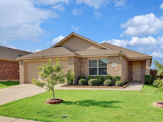 view of front of house with a garage and a front yard