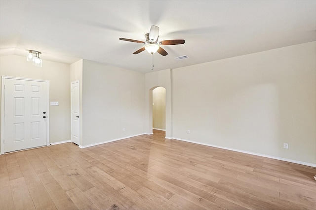 empty room featuring light hardwood / wood-style floors and ceiling fan