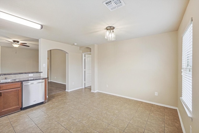 kitchen with dishwasher, plenty of natural light, sink, and ceiling fan