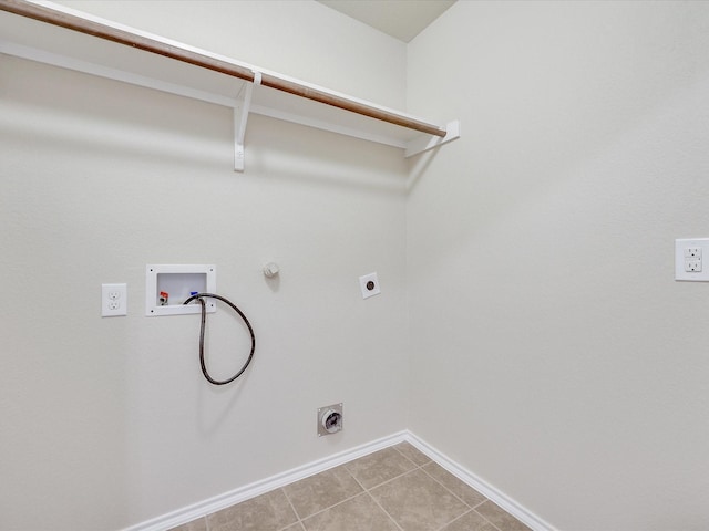 laundry room with hookup for a washing machine, hookup for a gas dryer, tile patterned floors, and hookup for an electric dryer