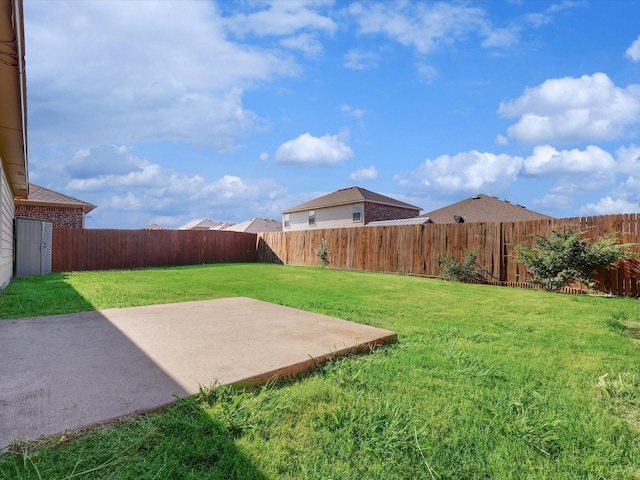 view of yard with a patio area