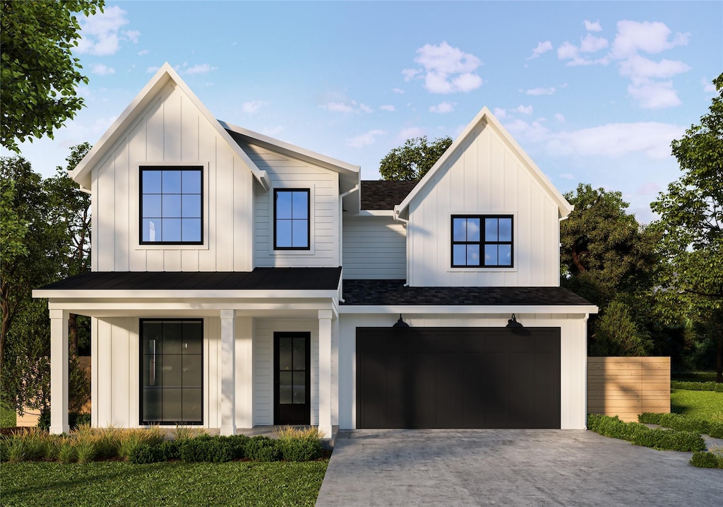 modern inspired farmhouse featuring a porch and a garage