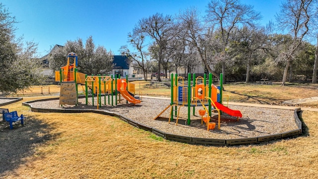 view of playground featuring a lawn