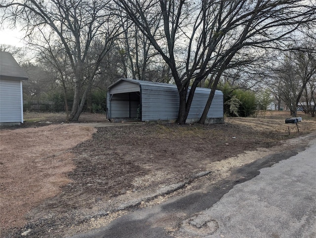 view of outdoor structure featuring a carport