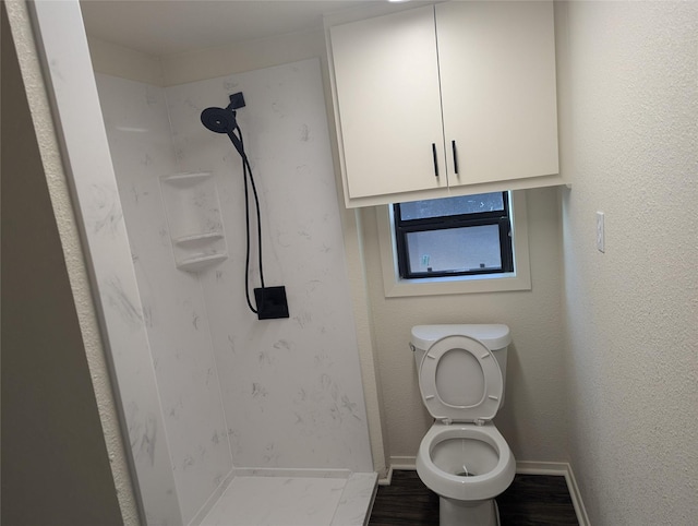 bathroom with walk in shower, wood-type flooring, and toilet