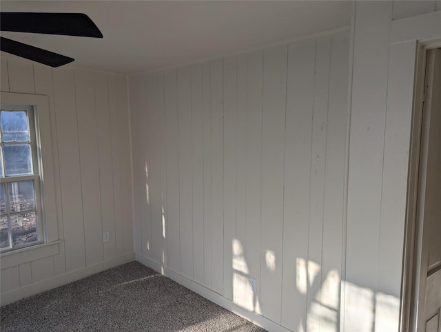 unfurnished room with a healthy amount of sunlight and carpet