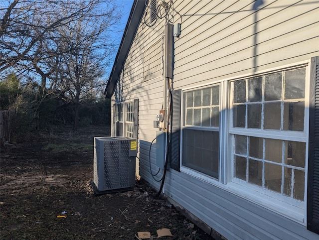 view of home's exterior with central air condition unit