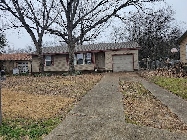 single story home with a garage