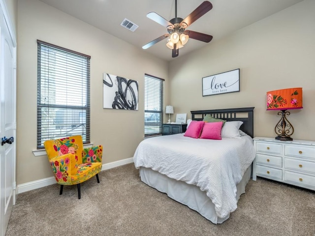 carpeted bedroom featuring ceiling fan