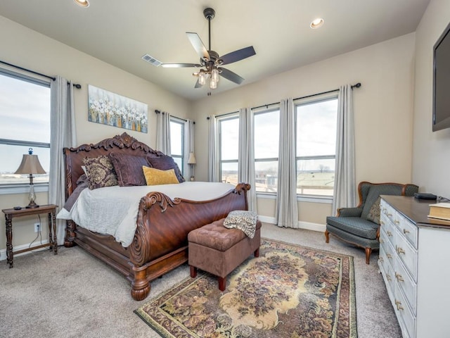 carpeted bedroom featuring ceiling fan