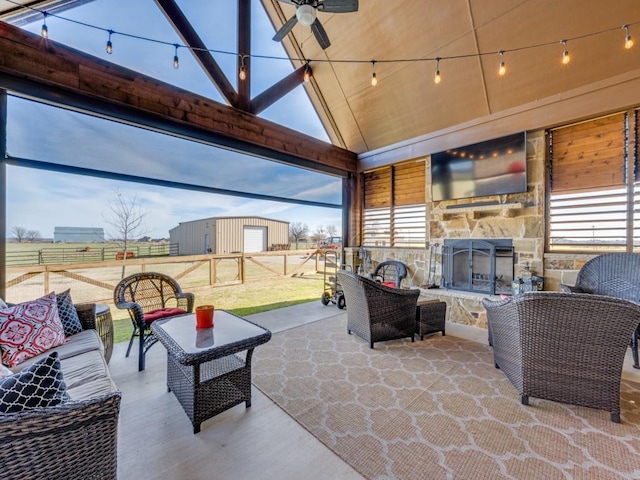 view of patio / terrace featuring a rural view, an outdoor hangout area, and ceiling fan