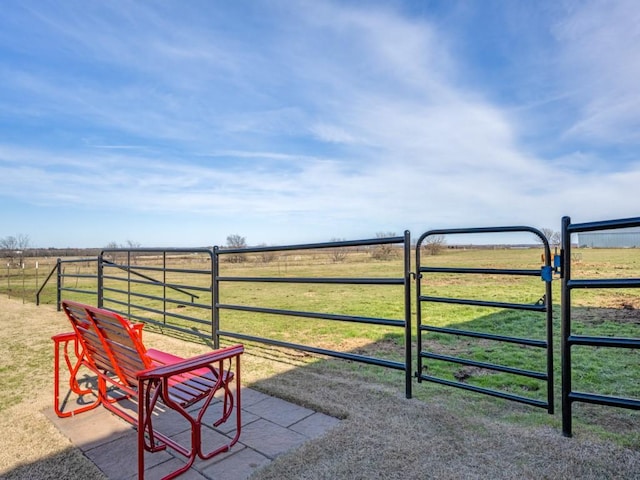 view of gate featuring a rural view