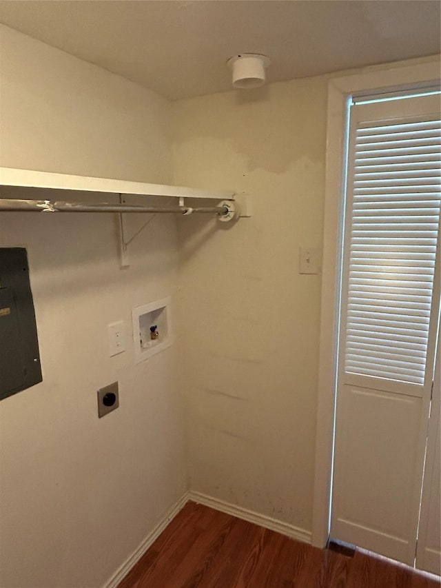 laundry room featuring electric dryer hookup, hookup for a washing machine, and dark wood-type flooring