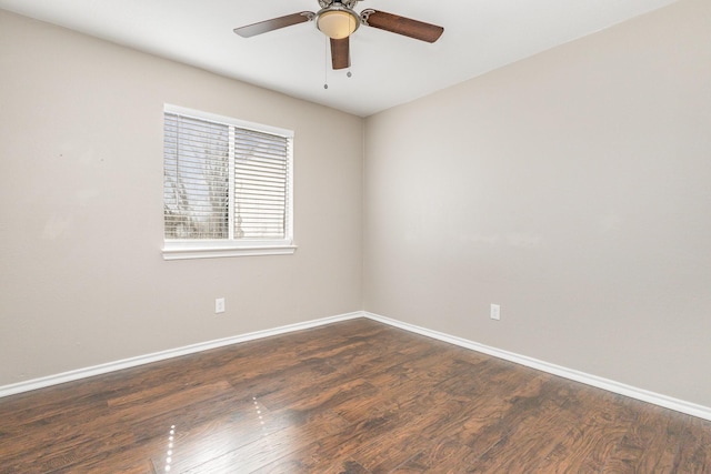 unfurnished room with ceiling fan and dark hardwood / wood-style floors