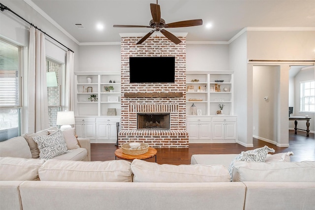 957 Prairie Timber Rd, Burleson, TX 76028 - living room featuring crown molding, a ceiling fan, dark wood-type flooring, and visible vents