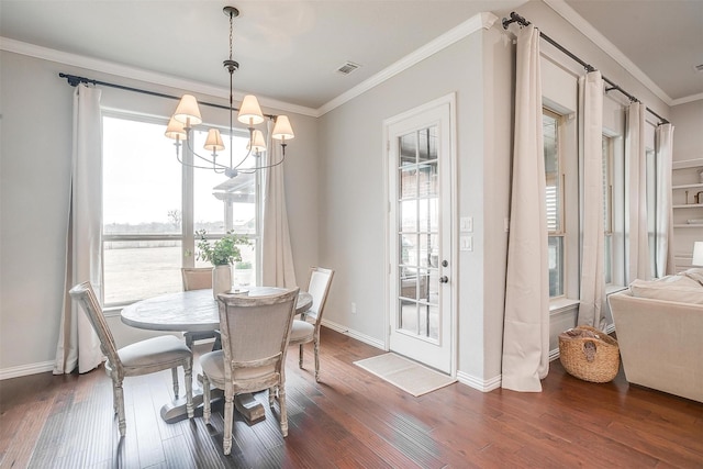 957 Prairie Timber Rd, Burleson, TX 76028 - dining room with visible vents, crown molding, dark wood-style flooring, an inviting chandelier, and baseboards
