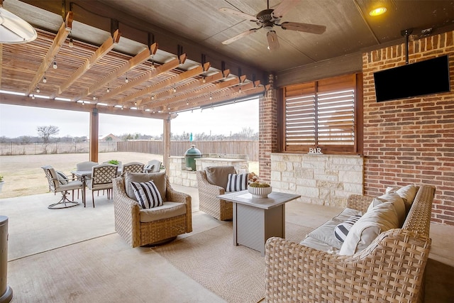 view of patio / terrace with ceiling fan and an outdoor hangout area