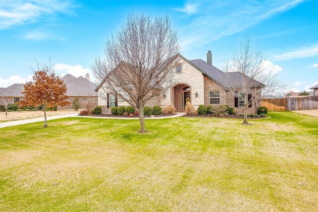 view of front of home with a front yard