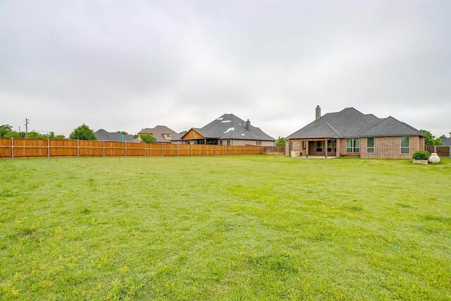 957 Prairie Timber Rd, Burleson, TX 76028 - view of yard featuring a fenced backyard