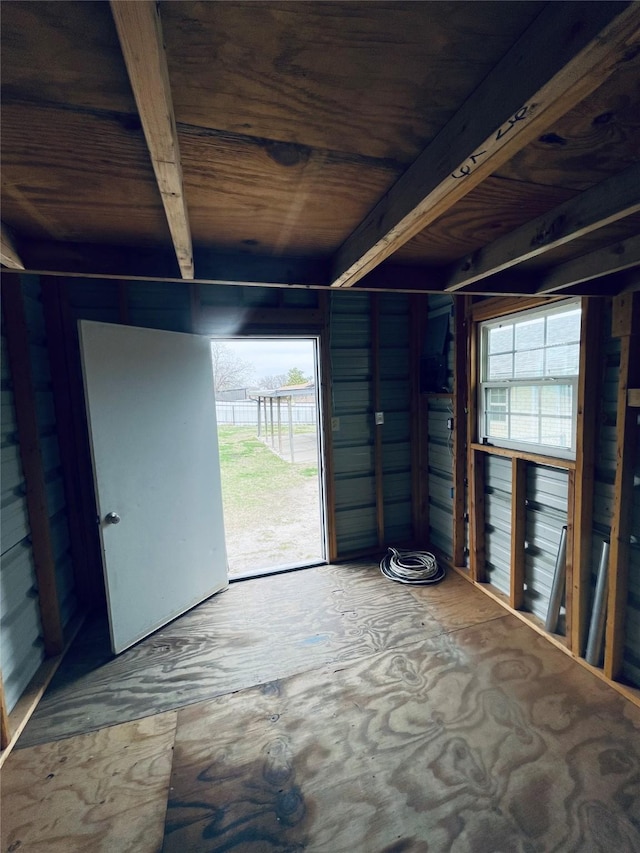 misc room with beam ceiling and wooden ceiling