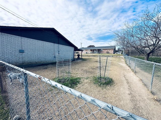 view of yard featuring fence