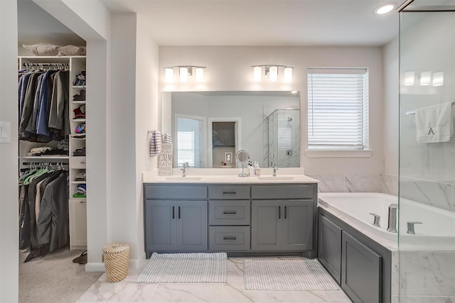 bathroom with vanity and plus walk in shower