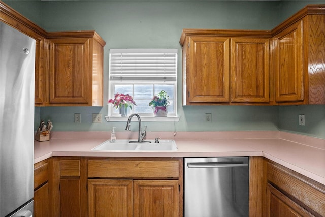 kitchen featuring stainless steel appliances and sink