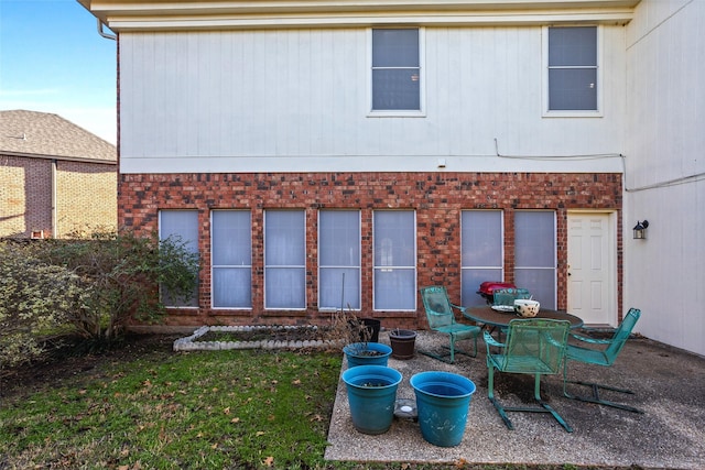 rear view of house featuring a patio