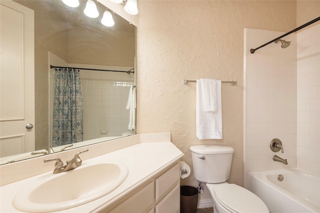 bathroom with a textured wall, vanity, toilet, and shower / tub combo with curtain