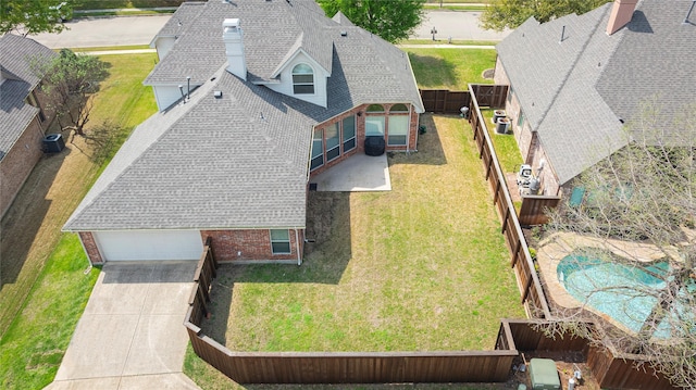 view of subject property with a pool area