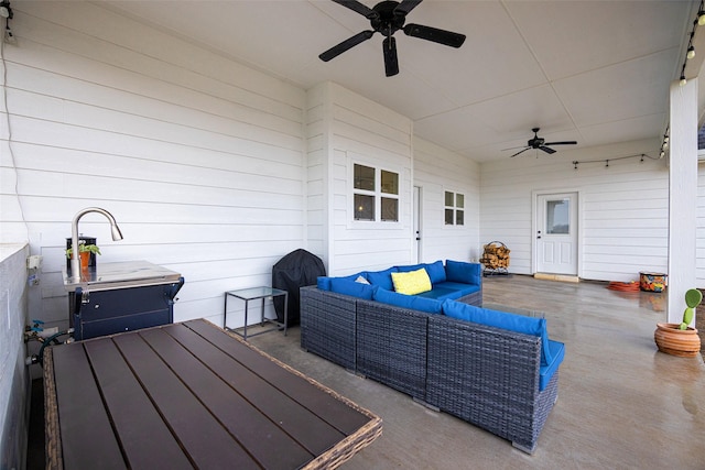 view of patio / terrace featuring ceiling fan and an outdoor hangout area