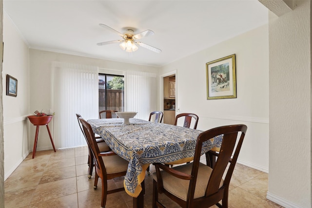 dining area featuring light tile patterned flooring and ceiling fan