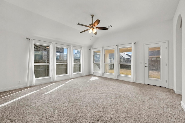 interior space featuring ceiling fan, lofted ceiling, and carpet flooring