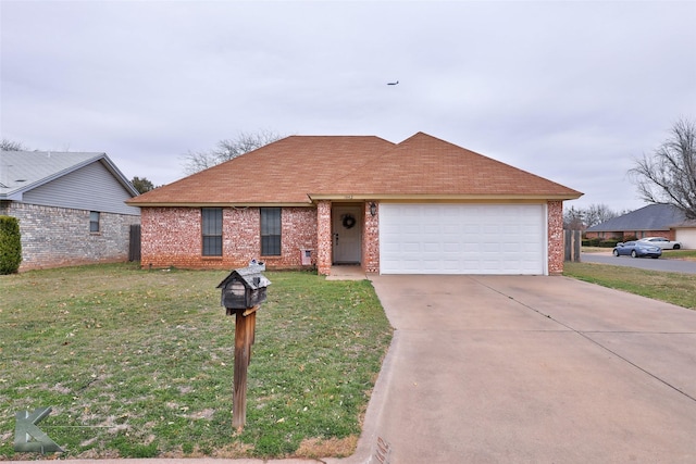 single story home featuring a garage and a front lawn