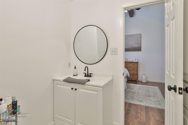 bathroom featuring vanity and hardwood / wood-style floors