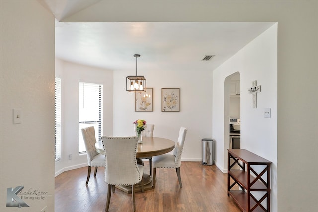 dining area featuring hardwood / wood-style flooring