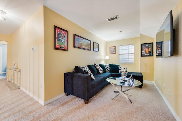 living room featuring light carpet