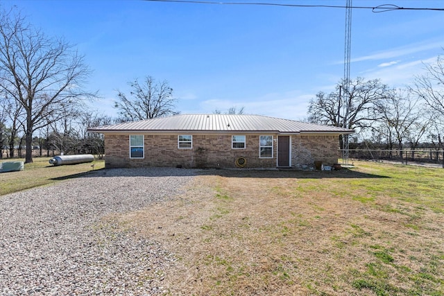 back of house with a yard