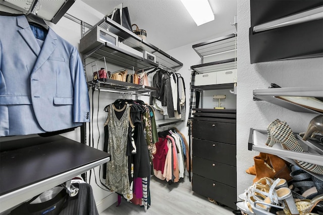 spacious closet with light wood-type flooring