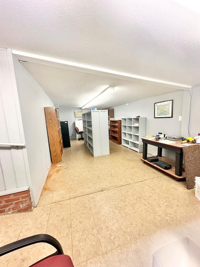 interior space featuring a textured ceiling