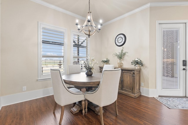 dining room featuring dark wood finished floors, crown molding, and baseboards