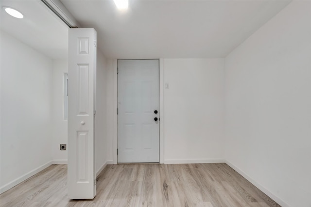 unfurnished room featuring light hardwood / wood-style floors