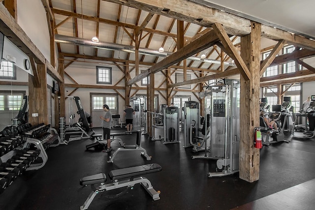 gym with high vaulted ceiling