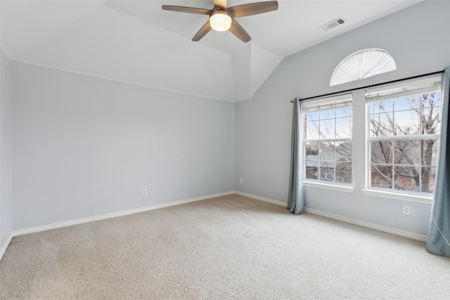 additional living space featuring vaulted ceiling, light colored carpet, and ceiling fan