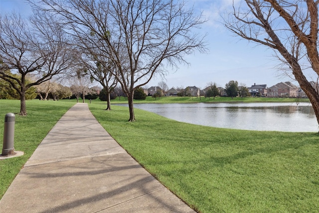 exterior space with a water view