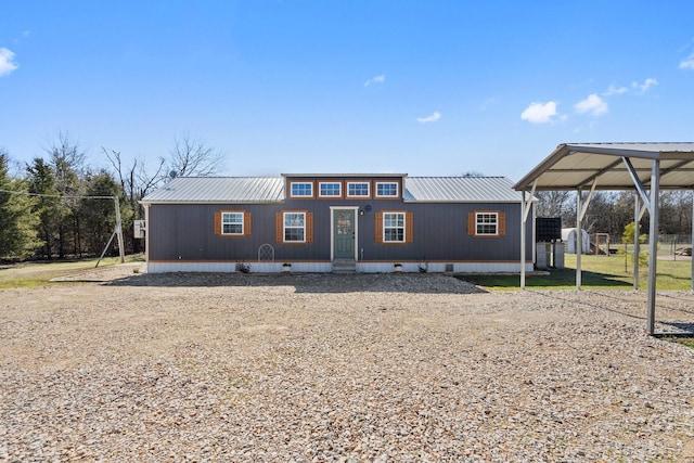 view of front of property with a carport