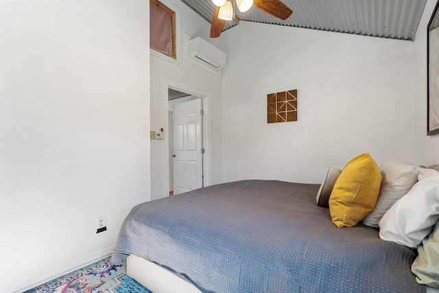 bedroom with lofted ceiling, a wall mounted AC, and ceiling fan