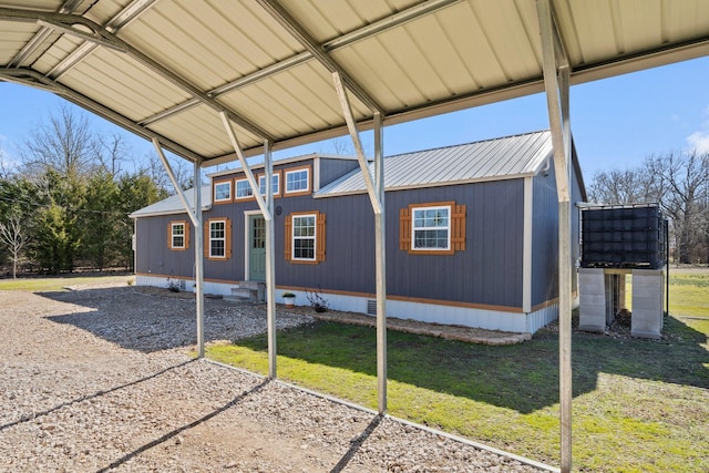 view of side of home featuring a yard